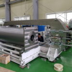 Assembly of wire winding vessel and yoke for HPP